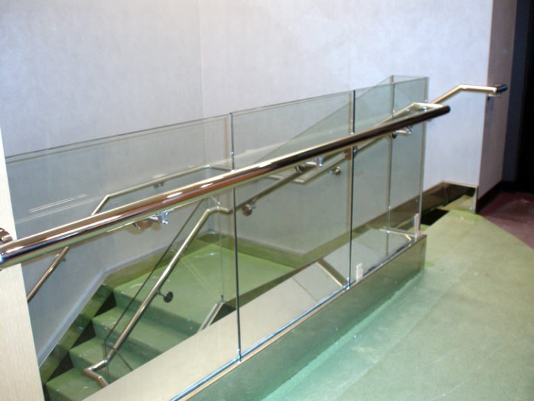 Polished Stainless Steel and Glass Rail