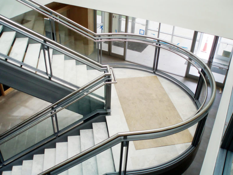 Satin Stainless Steel and Glass Bearing Rails - Sleepy's Corporate Headquarters